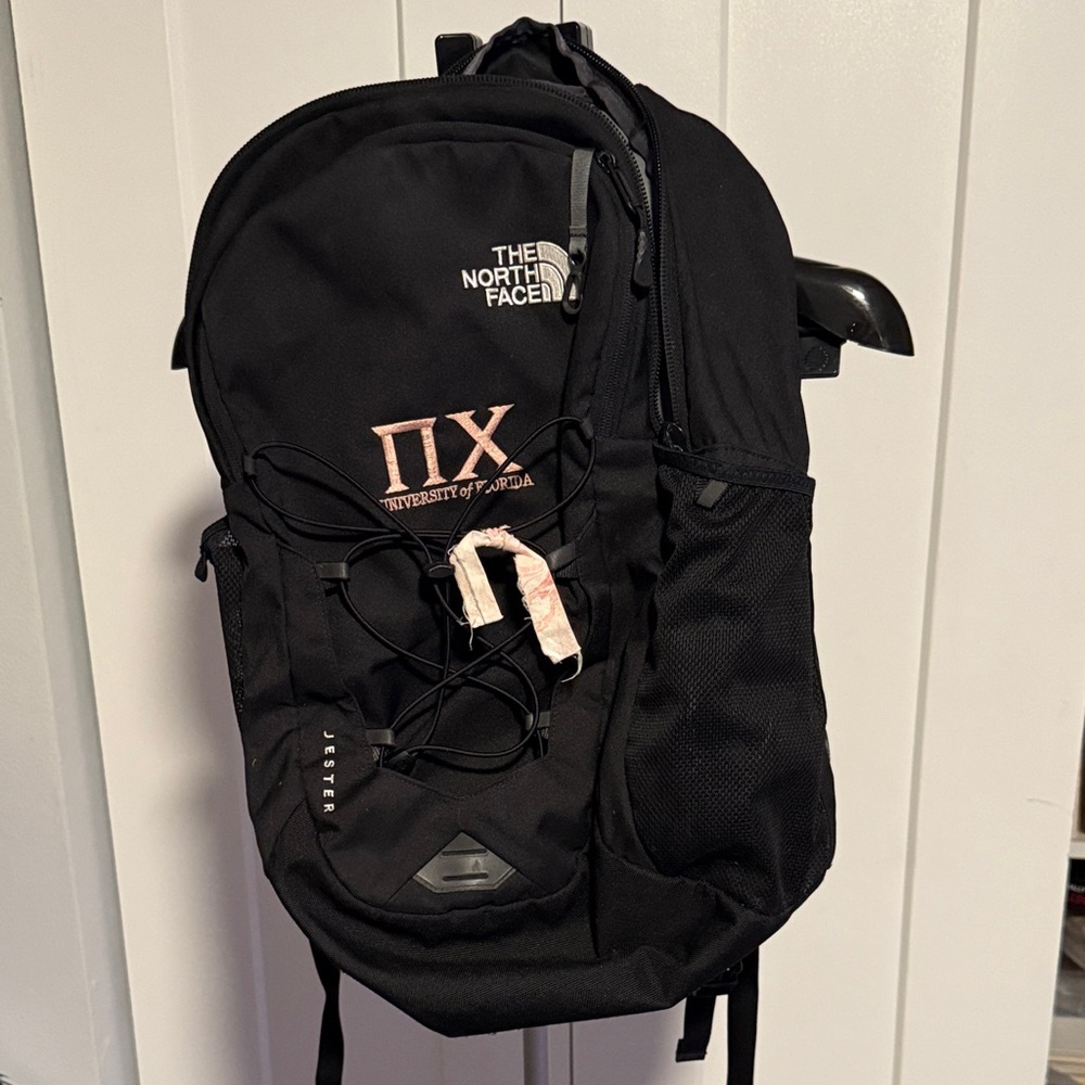 The North Face Black Backpack with Pink Accents